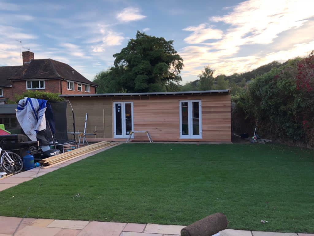 Cedar garden room studio with new turf lawn, Surrey