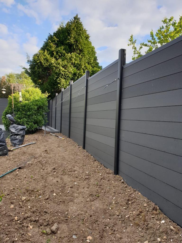 Dark grey composite privacy fence new installation, Surrey